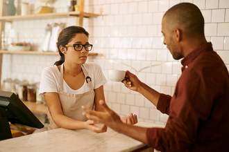 a barista deals with a rude customer