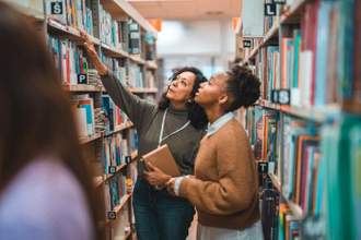 a librarian helping someone find a book