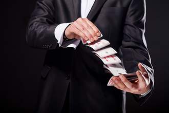 a magician performing a card trick