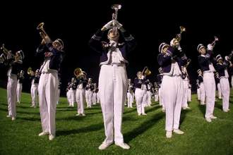 a marching band playing their instruments