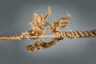 a piece of robe being pulled apart