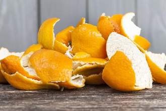 a pile of orange rinds