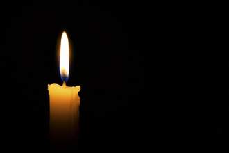 a single burning candle