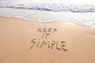 a view by the ocean with keep it simple drawn in the sand