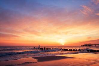 a view of the ocean at dusk