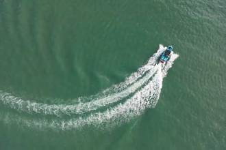aerial view of a boat moving in the water