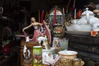 an assortment of trinkets in an antique store
