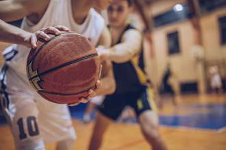 basketball player playing tight defense