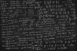 blackboard full of equations
