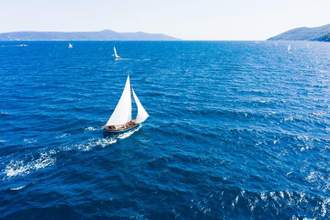 boat sailing on the open ocean