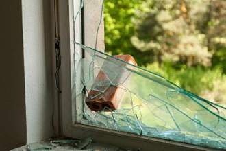 brick that was thrown through a window