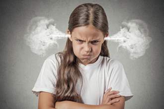 child looking extremely angry pouting with steam coming out of her ears