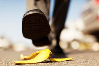 close up of foot about to step on banana peel