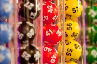 close up view of lottery balls in tubes