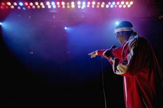 comedian pointing into crowd