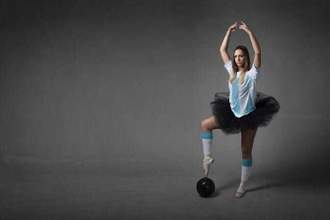 female soccer player trying ballet