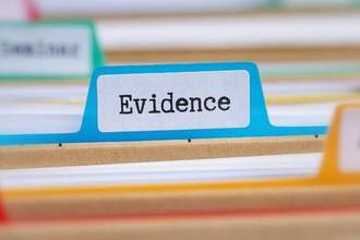 file folders with a tab labeled evidence