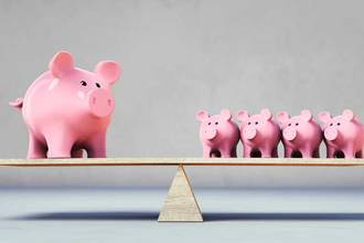 four pigs on one side of a seesaw balanced with one large pig on the other side