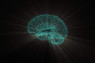 glowing brain diagram in points of light