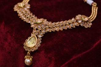 golden necklace set closeup
