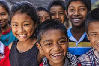 group of children smiling at the camera
