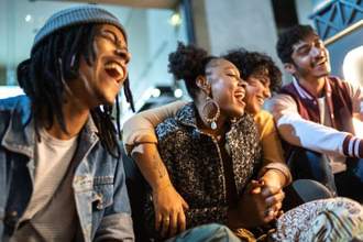 group of friends laughing and having a good time together