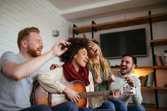 group of friends singing together