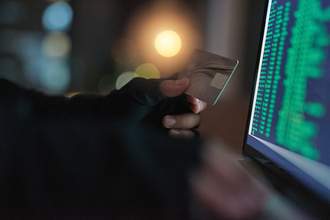 hacker hacking into credit card account