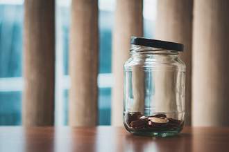 jar with a few pennies in it