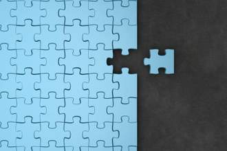 jigsaw puzzle being pieced together