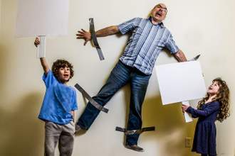 kids rebellion led to strapping the father on wall