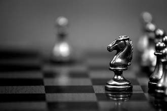 knight piece moved forward on chess board