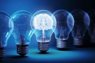 line up of light bulbs with one glowing bulb holding a brain