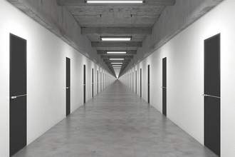 long hallway with repeating doors