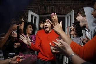 man being surprised by his friends