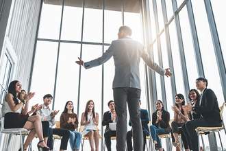 man giving speech at work
