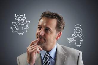 man looking at devil on his shoulder