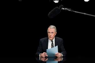 news reporter getting ready for a broadcast