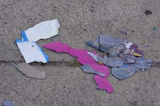 paint chips littered on the ground