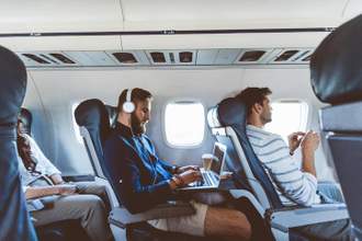 passengers sitting in an airplane