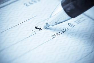 pen writing on blank check