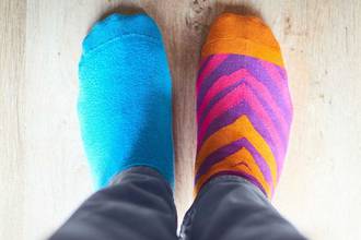 person wearing mismatched socks