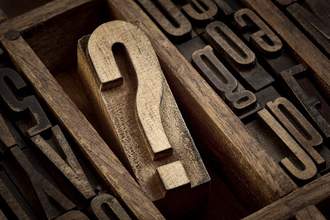 question mark printing press block