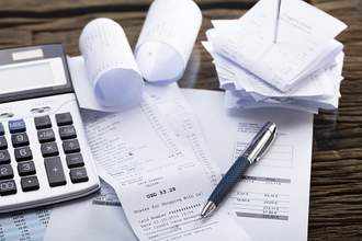receipts next to calculator