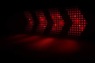 red arrow lights on wall