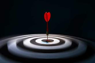 red dart that hit the center of a dartboard