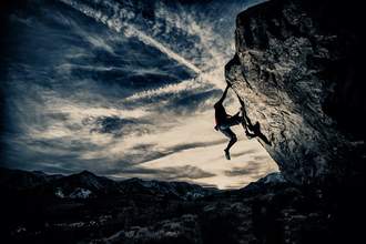 rock climber on cliff