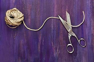 scissors cutting twine