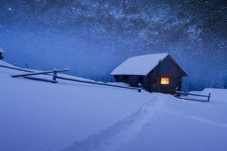 secluded snow covered cabin