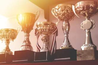 shelf of trophies and awards